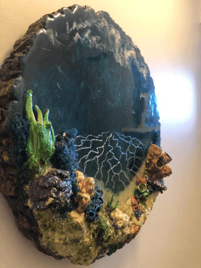 Underwater Art in Wooden Log 