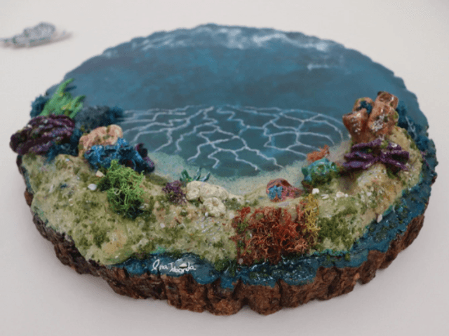 Underwater Art in Wooden Log 
