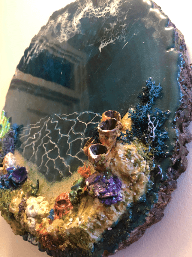 Underwater Art in Wooden Log 